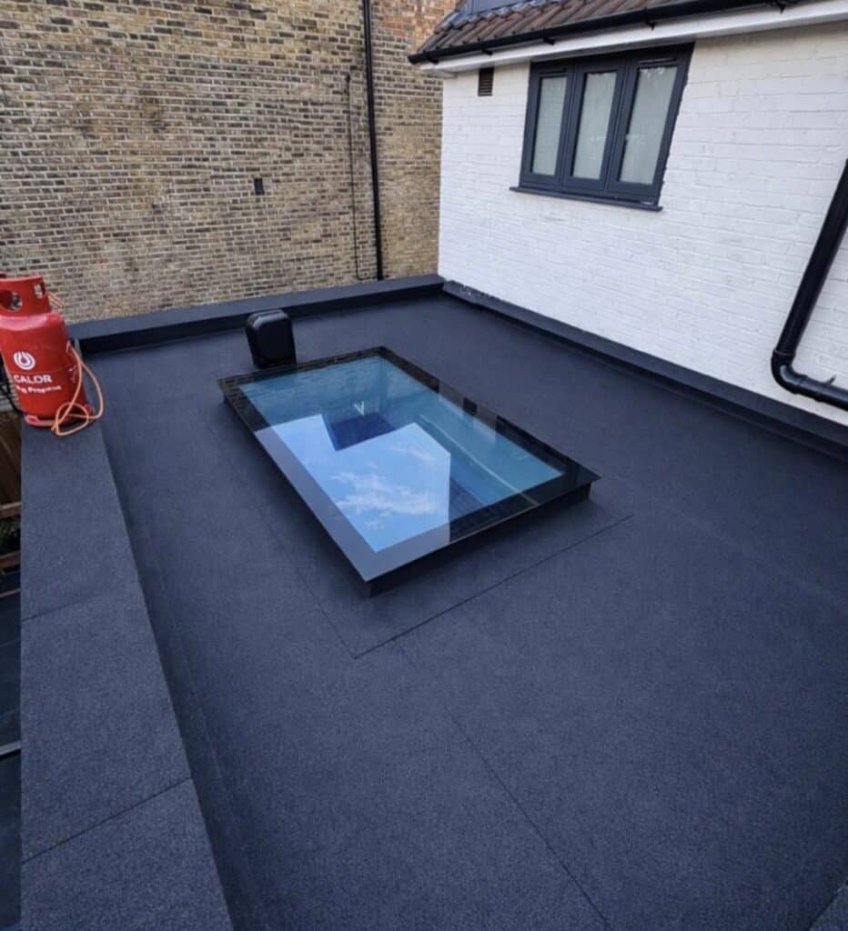 High-Performance Flat Roof Installation With Sleek Flat Rooflight
